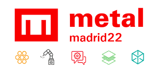 El logotipo de "METALMADRID 2022" presenta de forma destacada un emblema rojo e íconos que simbolizan temas de la industria como la automatización, la tecnología y la ingeniería.