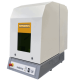 Una máquina Sisma Smark blanca y gris con botones de control y un interruptor de parada de emergencia en el panel frontal.