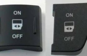 Dos interruptores de palanca negros con etiquetas "ON" y "OFF" y flechas direccionales en el centro.