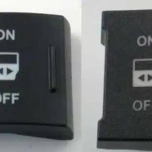 Dos interruptores de palanca negros con etiquetas "ON" y "OFF" y flechas direccionales en el centro.