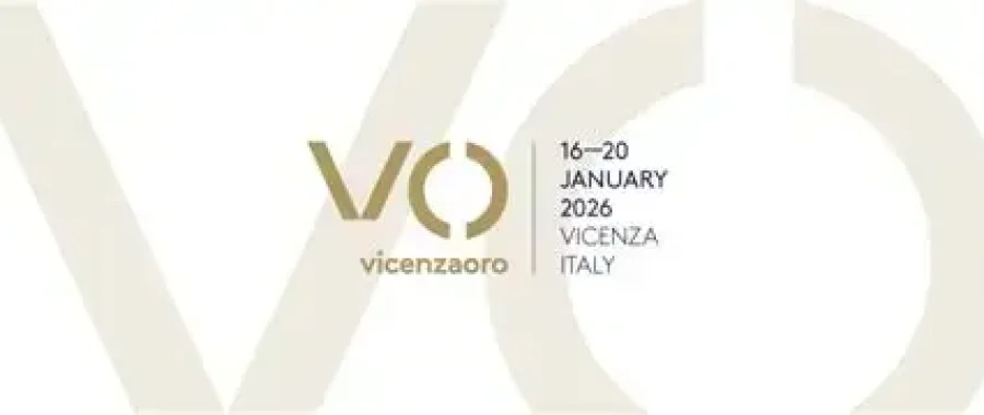 Logotipo de Vicenzaoro con detalles del evento: 16-20 de enero de 2026, Vicenza, Italia, y un guiño a la 31ª BIEMH 2022, sobre un fondo blanco con letras "VO" grandes y tenues.